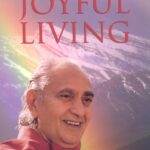 The Art of Joyful Living by Swami Rama paperback book cover, spiritual guide to happiness and mindfulness.