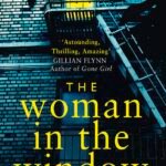 Cover of The Woman in the Window by A. J. Finn: dark façade with red and blue striped blinds obscuring the title, evoking secrecy and suspense; the author’s name sits below in a clean, bold font.