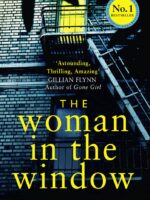 Cover of The Woman in the Window by A. J. Finn: dark façade with red and blue striped blinds obscuring the title, evoking secrecy and suspense; the author’s name sits below in a clean, bold font.